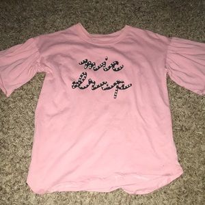 Pink, short puffy sleeved t-shirt, with little pearl beads